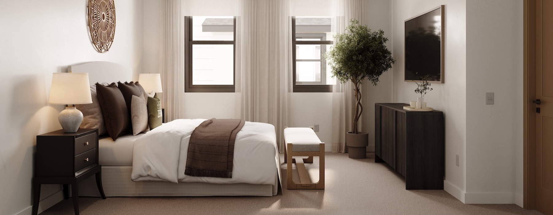 a bedroom with a bed and a fan