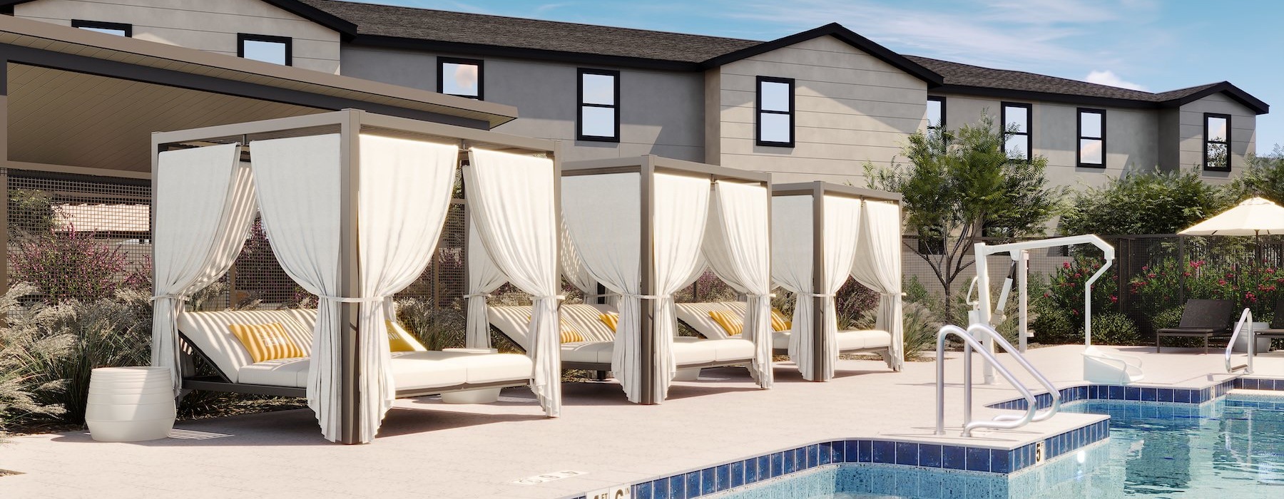 a pool with white umbrellas
