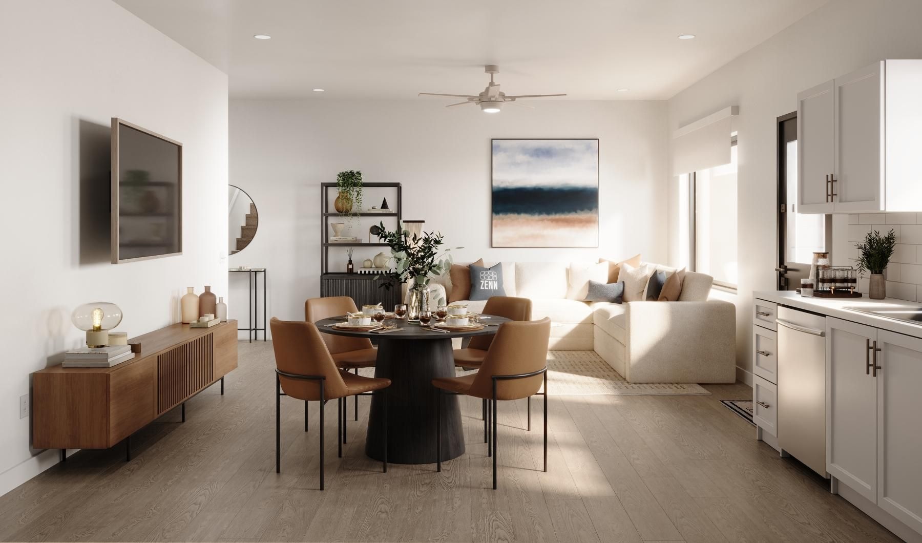 a large living room with a dining table couch and tv
