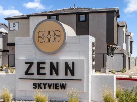 Zenn monument sign in front of a townhome