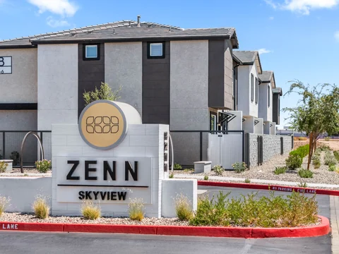 Townhome exterior behind the Zenn Skyview monument sign