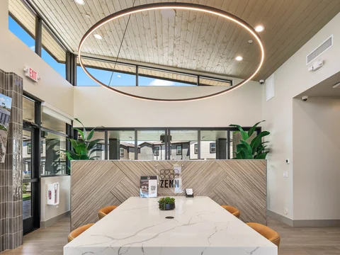 Ring chandelier above the clubhouse gathering table